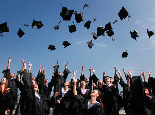 University caps being thrown into air